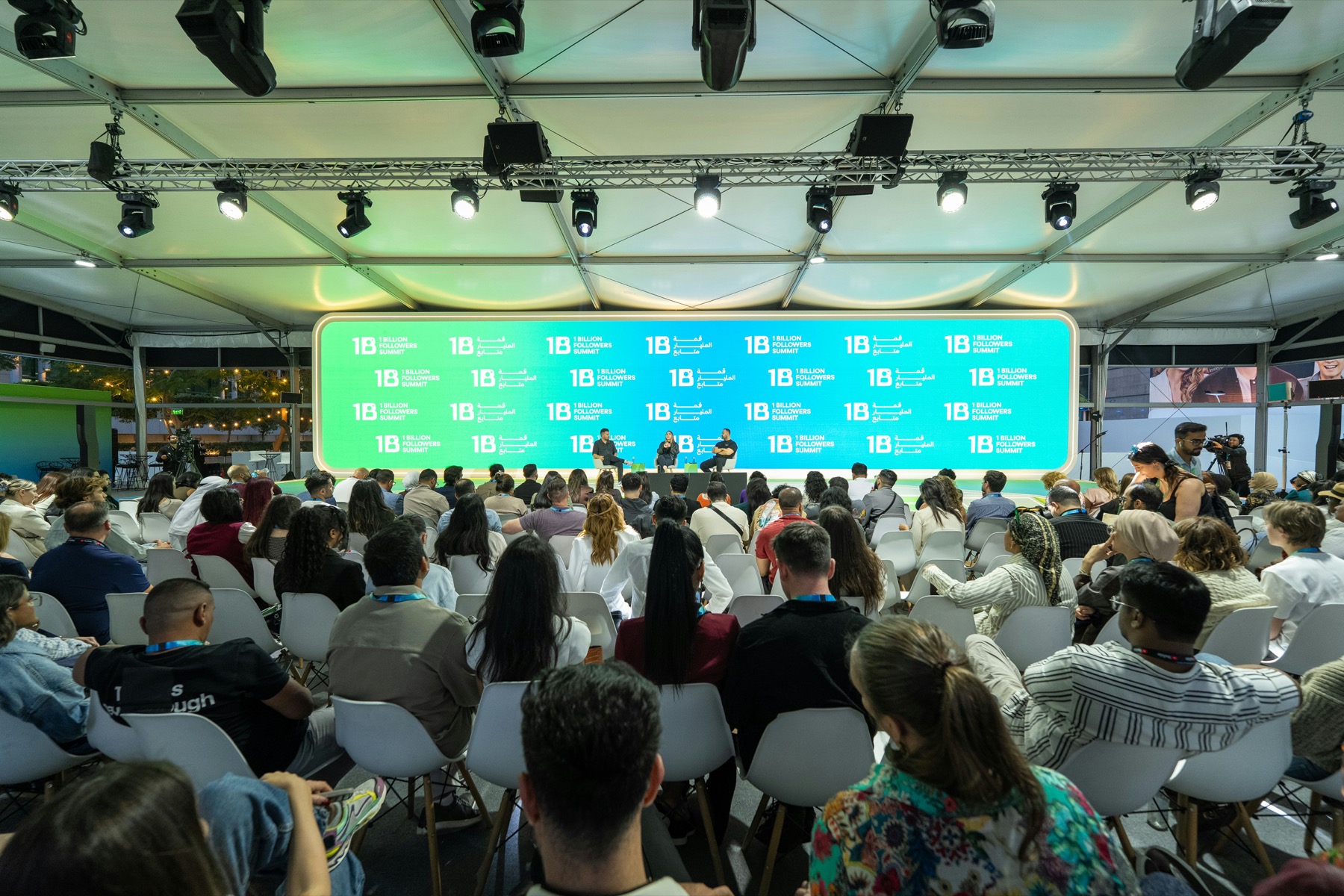 Audience watching an Industry Days style conference session